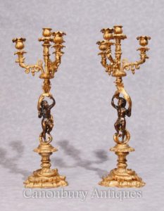 Coppia Impero francese antico bronzo dorato Candelabri Dore Cherubino Candele