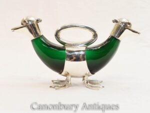 Piatto d'argento anatra porta spirito brocca decanter